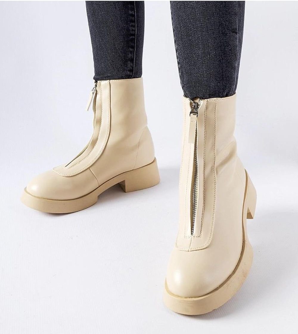 Beige insulated ankle boots with a zipper