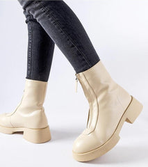 Beige insulated ankle boots with a zipper