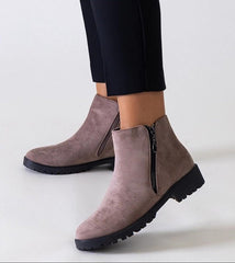 Branda black ankle boots with metal inserts