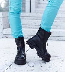 Black lined ankle boots with a zip