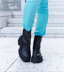 Black lined ankle boots with a zip