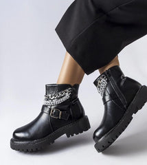 Black ankle boots with decorative chains