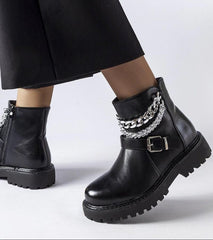 Black ankle boots with decorative chains