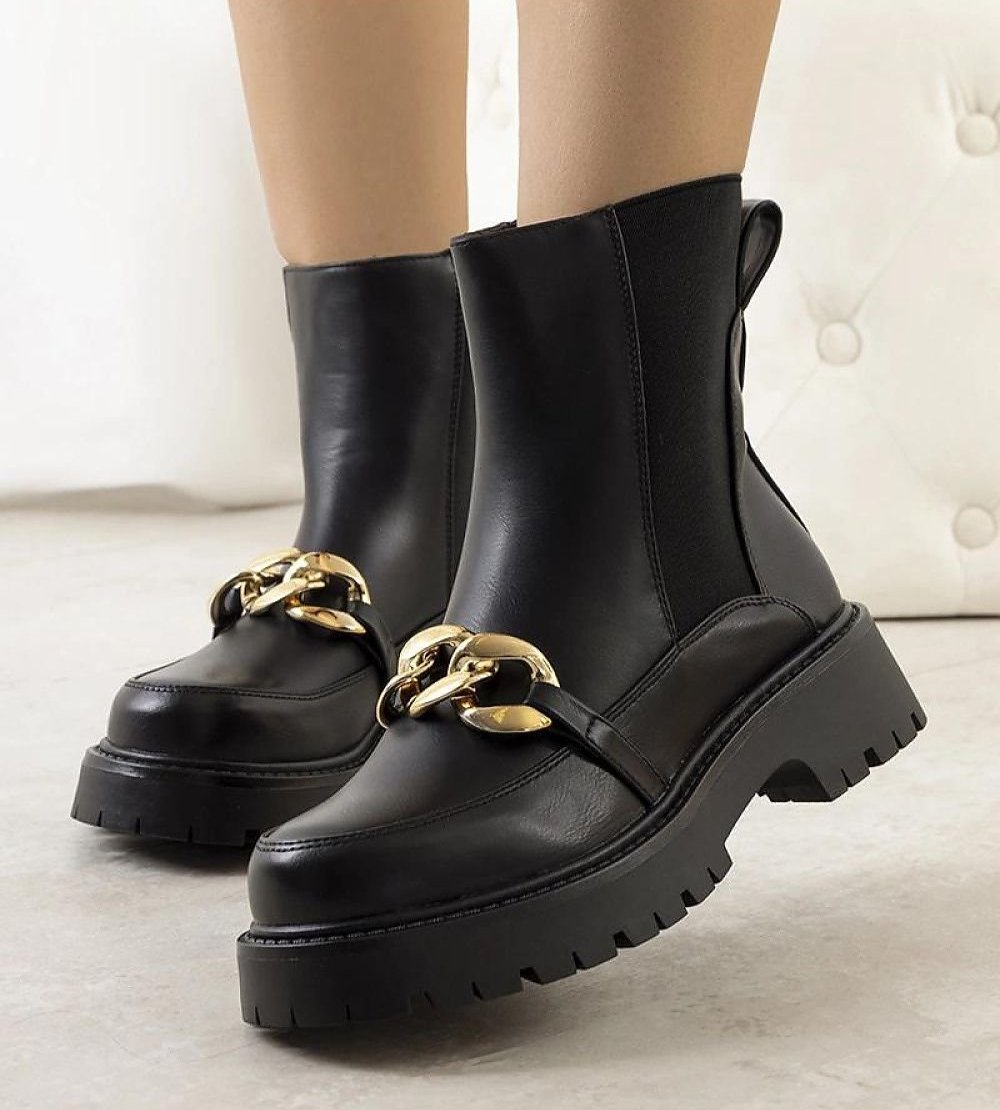 Pesa Black ankle boots with a high sole