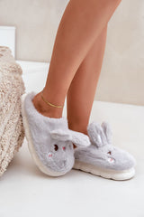 Charming women's furry slippers with a rabbit motif