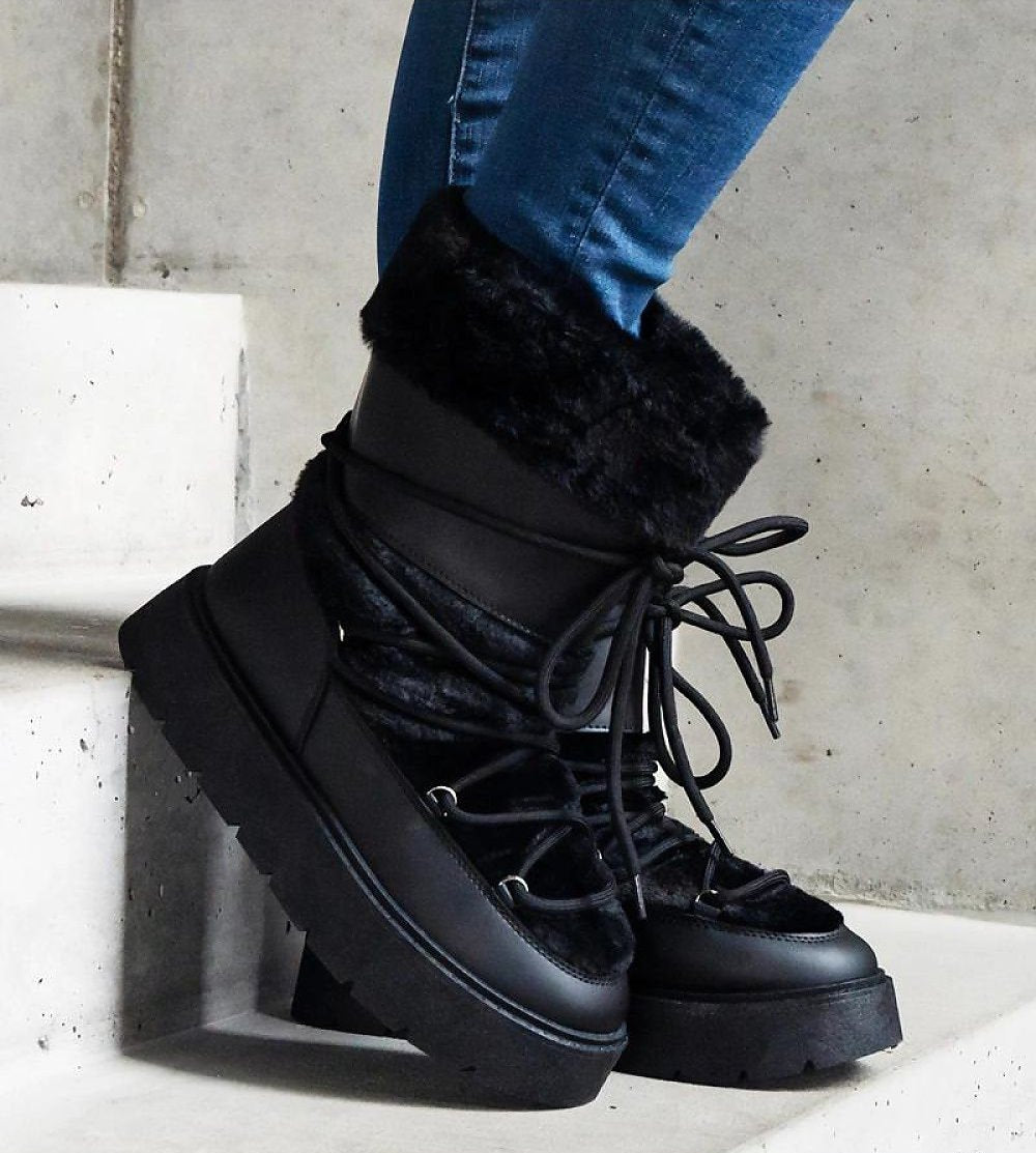 Black fur insulated lace-up snow boots