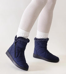 Grey snow boots with fur trim