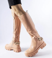 Pink flat knee-high boots with a chain