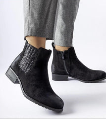 Black heel boots with decorative inserts