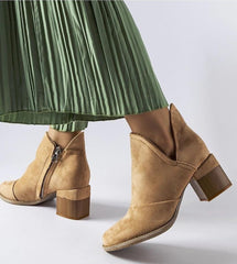 Beige heel boots with irregular upper