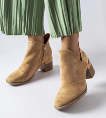 Beige heel boots with irregular upper