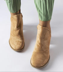 Beige heel boots with irregular upper