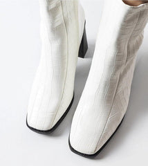 White elegant ankle heel boots