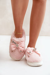 Charming buttons and a bow furry slipper