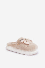 Charming buttons and a bow furry slipper