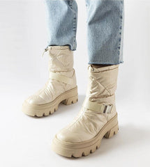 Beige patent high upper snow boots