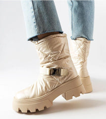 Beige patent high upper snow boots