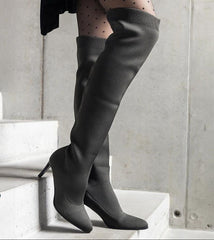 Black slip-on heel boots with elastic upper