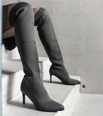 Black slip-on heel boots with elastic upper