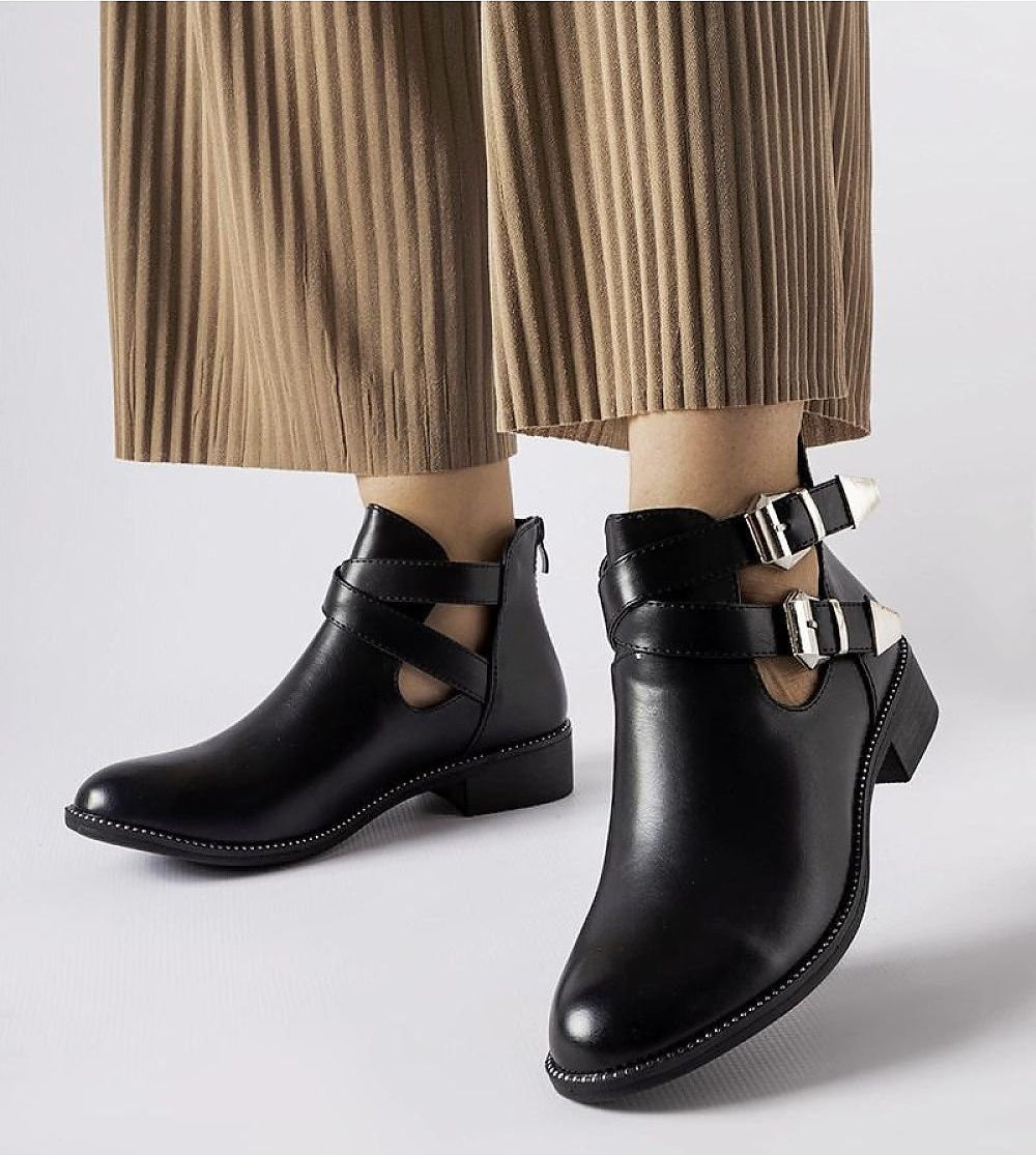 Black cut-out boots with Franca buckles