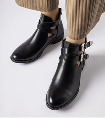 Black cut-out boots with Franca buckles