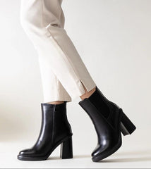 Stylish black eco leather heel boots