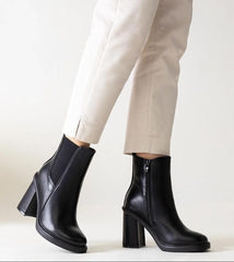 Stylish black eco leather heel boots