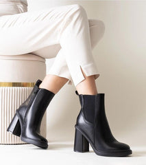 Stylish black eco leather heel boots