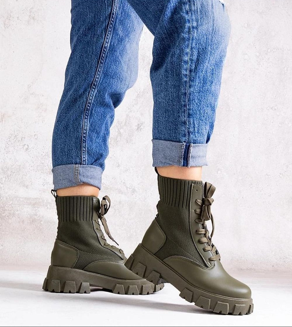 Green boots with elastic upper