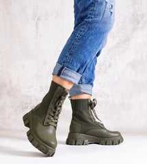 Green boots with elastic upper