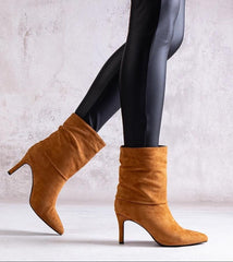 Brown stiletto heeled boots