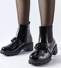 Elegant patent leather boots in black