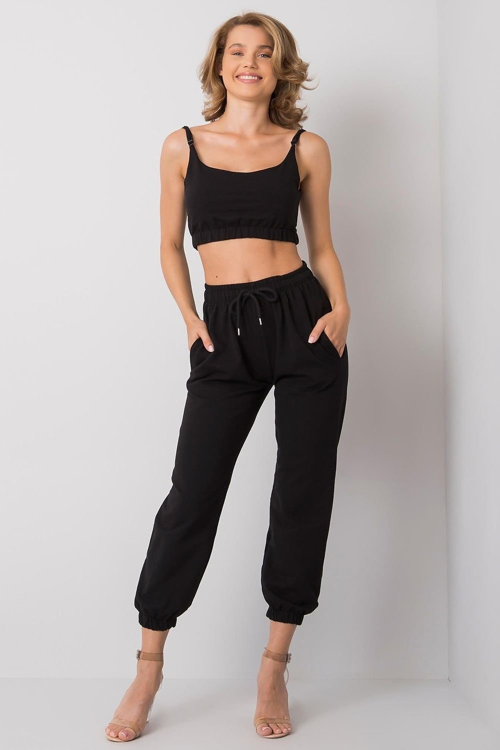 Sports set composed of a top and sweatpants