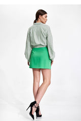 Unlined mini skirt with a covered zip at the side
