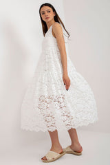 Sleeveless openwork dress with a flared cut