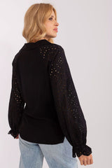 Elegant long-sleeved blouse with an openwork pattern