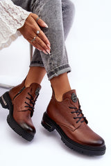 Fashionable ankle boots with a decoration