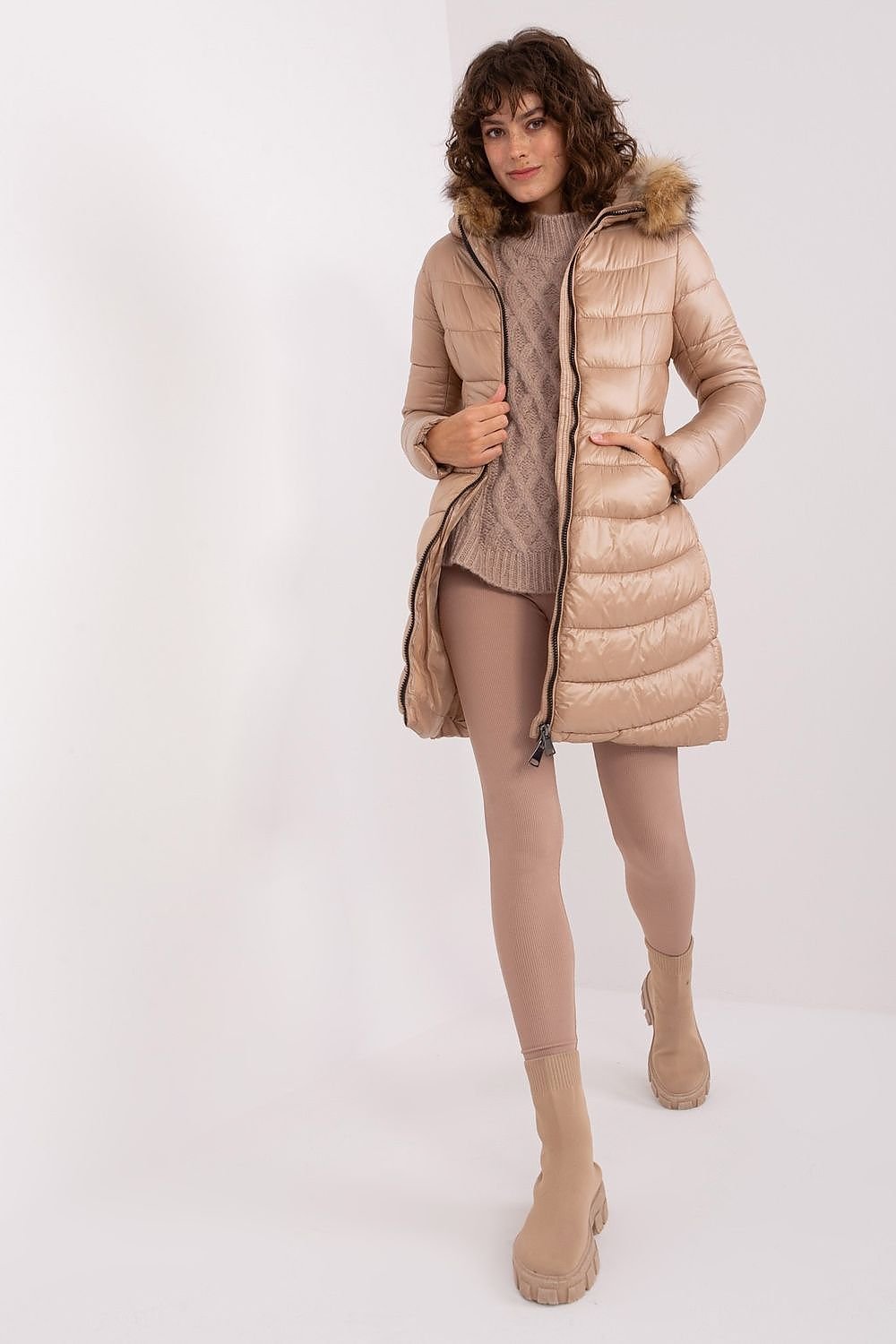 Beige quilted jacket with fur-lined hood