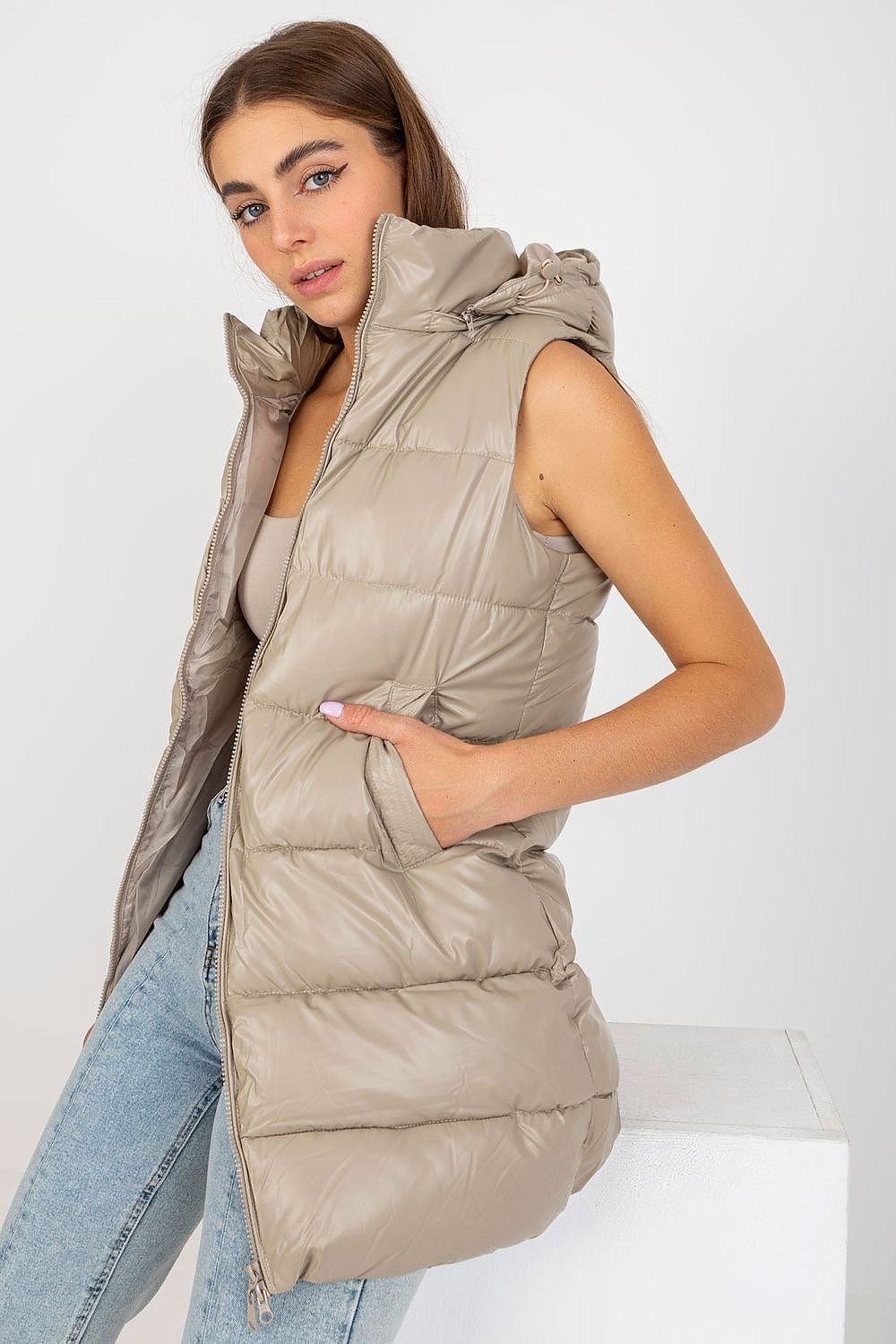 Down quilted vest with detachable hood