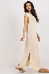 Long knit sleeveless beach dress with decorative slits